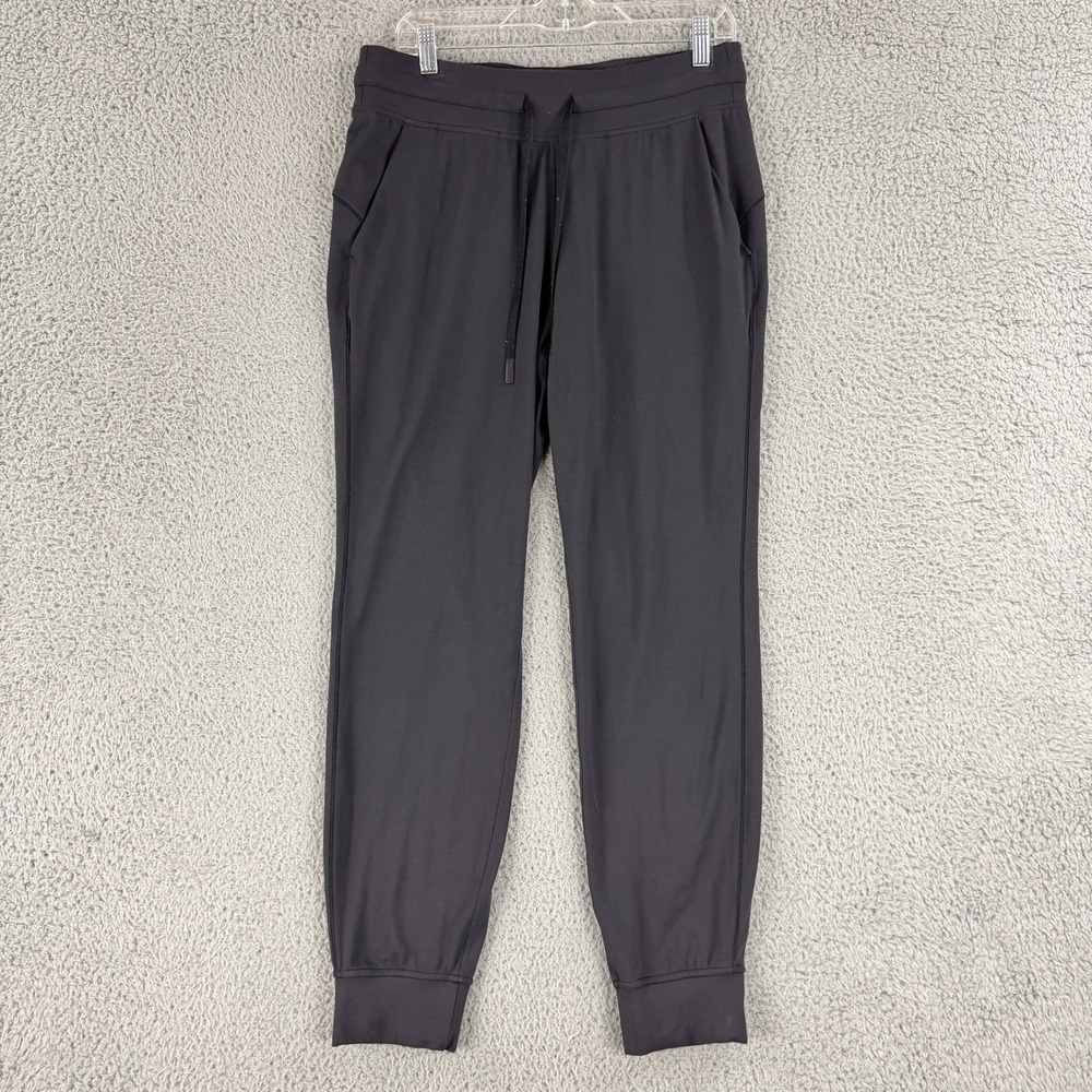 Lululemon On the Fly Jogger Womens 10 Black Luxtreme Drawstring Tapered Pants